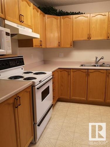 #229 15499 Castle Downs Road Rd Nw Nw, Edmonton, AB - Indoor Photo Showing Kitchen With Double Sink