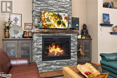 1083 Riding Ranch Road, Machar Twp, ON - Indoor Photo Showing Living Room With Fireplace
