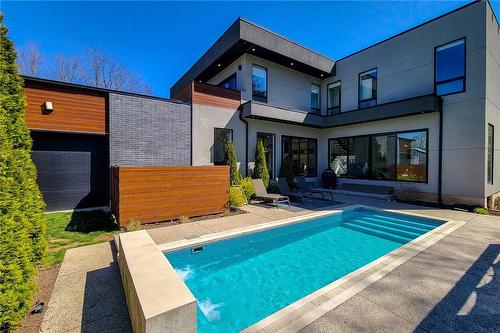 142 Mohawk Road, Ancaster, ON - Outdoor With In Ground Pool