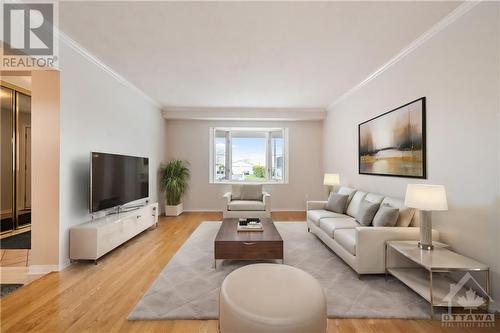 This photo has been virtually staged. - 1370 Marchand Street, Ottawa, ON - Indoor Photo Showing Living Room