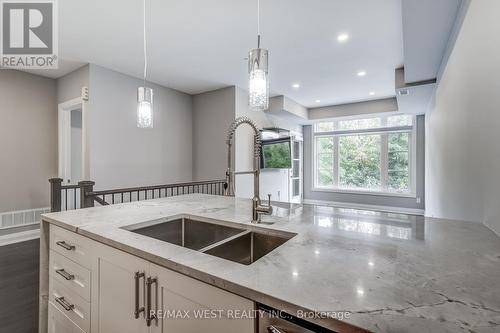 22 - 8169 Kipling Avenue E, Vaughan, ON - Indoor Photo Showing Kitchen With Double Sink