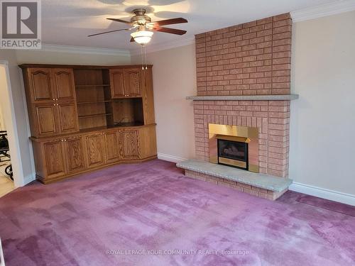 44 Hadera Pl, Georgina, ON - Indoor Photo Showing Living Room With Fireplace
