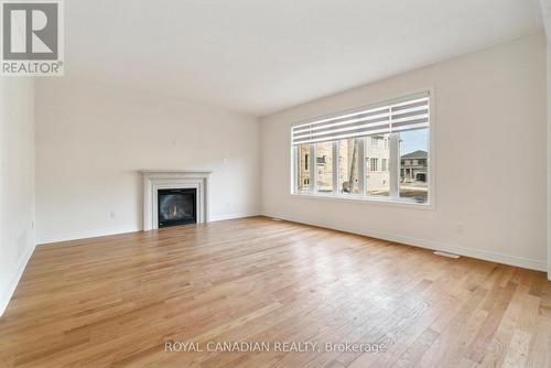 1409 Davis Loop, Innisfil, ON - Indoor Photo Showing Living Room With Fireplace