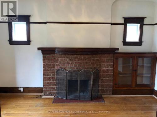 Toronto, ON - Indoor Photo Showing Other Room With Fireplace