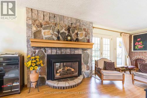 1249 Glen Miller Road, Quinte West, ON - Indoor Photo Showing Living Room With Fireplace