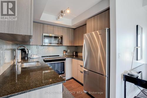 1123 - 30 Shore Breeze Drive, Toronto, ON - Indoor Photo Showing Kitchen With Upgraded Kitchen