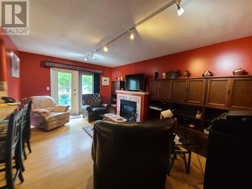 701 Dominion Street, Mcbride, BC - Indoor Photo Showing Other Room With Fireplace