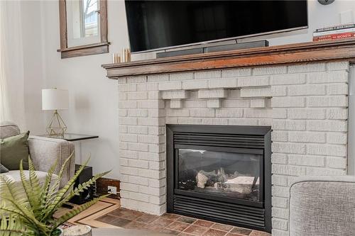 94 Holton Avenue S, Hamilton, ON - Indoor Photo Showing Living Room With Fireplace