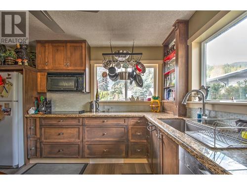 718 Swansea Point Road, Sicamous, BC - Indoor Photo Showing Kitchen With Double Sink