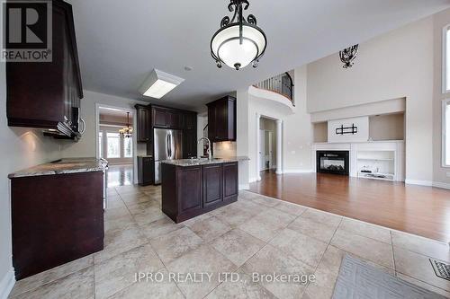 3329 Mistwell Crescent, Oakville, ON - Indoor Photo Showing Kitchen With Fireplace