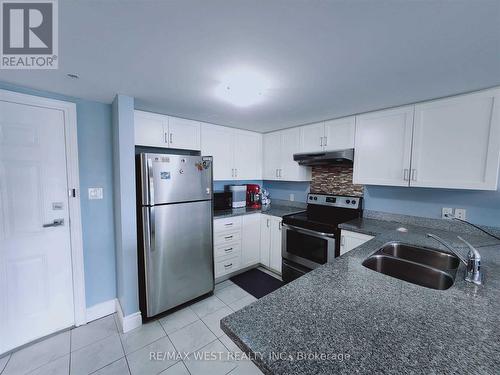 401 - 64 Frederick Drive, Guelph, ON - Indoor Photo Showing Kitchen With Double Sink