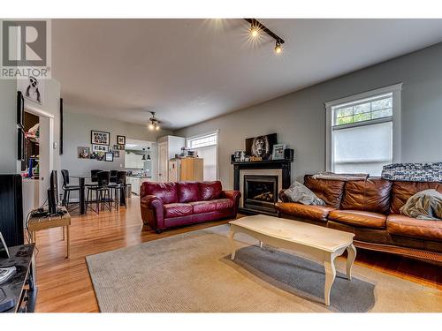 2092 Powerhouse Road, Spallumcheen, BC - Indoor Photo Showing Living Room With Fireplace