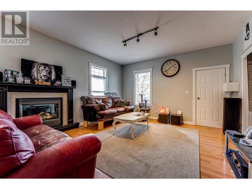 2092 Powerhouse Road, Spallumcheen, BC - Indoor Photo Showing Living Room With Fireplace