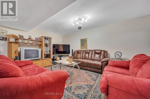 1742 Ennismore Cres, London, ON - Indoor Photo Showing Living Room With Fireplace