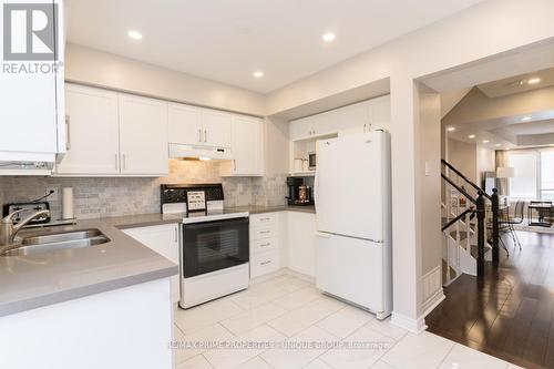 117 - 1050 Bristol Road W, Mississauga, ON - Indoor Photo Showing Kitchen With Double Sink