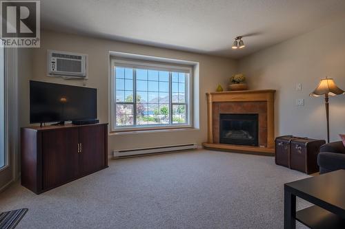 850 Railway Lane Unit# 201, Okanagan Falls, BC - Indoor Photo Showing Living Room With Fireplace