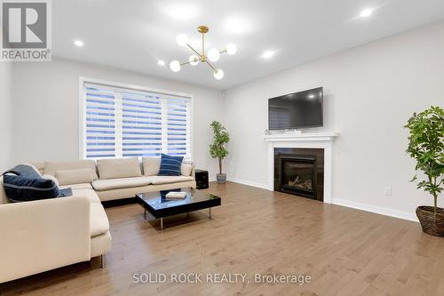 140 Rugosa Street, Ottawa, ON - Indoor Photo Showing Living Room With Fireplace