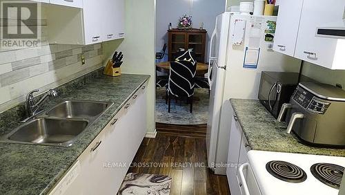 108 - 1 Quail Crescent, Barrie, ON - Indoor Photo Showing Kitchen With Double Sink