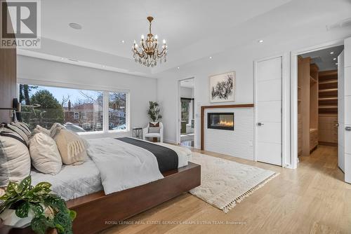 101 Rykert Crescent, Toronto, ON - Indoor Photo Showing Bedroom With Fireplace