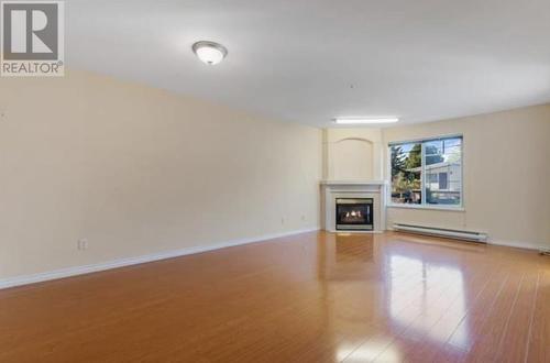 202 2505 E Broadway, Vancouver, BC - Indoor With Fireplace