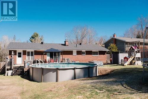 4 Johnston Drive, South River, ON - Outdoor With Above Ground Pool
