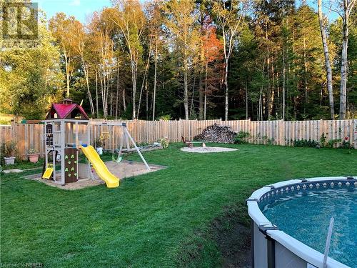 4 Johnston Drive, South River, ON - Outdoor With Backyard