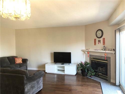 391 Stone Church Road E|Unit #52, Hamilton, ON - Indoor Photo Showing Living Room With Fireplace