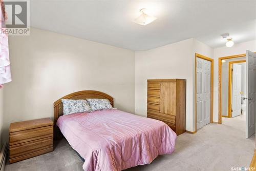 101 214 Ross Avenue, Dalmeny, SK - Indoor Photo Showing Bedroom