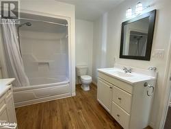 main floor bathroom previous photos before tenants - 