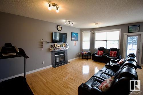 2624 Marion Place Pl Sw Sw, Edmonton, AB - Indoor Photo Showing Living Room With Fireplace
