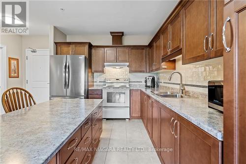 303 - 379 Scott Street, St. Catharines, ON - Indoor Photo Showing Kitchen With Double Sink