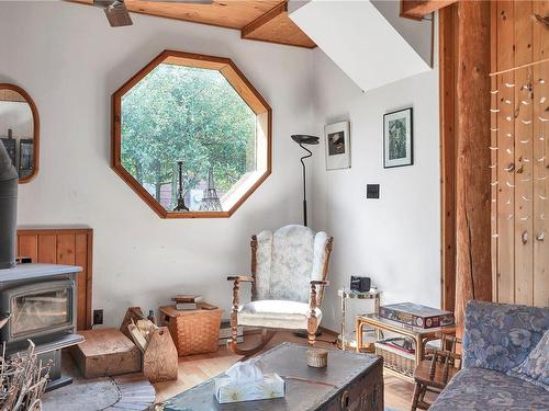 106 Quadra Loop, Quadra Island, BC - Indoor Photo Showing Living Room With Fireplace