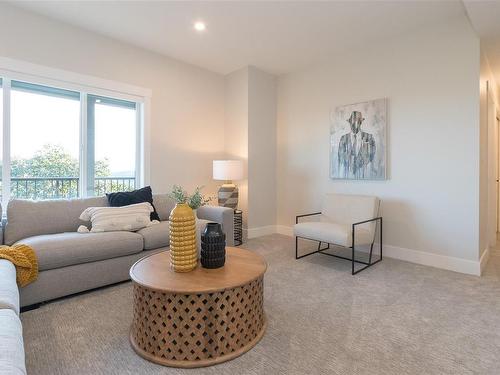 102-2576 Obsidian Pl, Langford, BC - Indoor Photo Showing Living Room