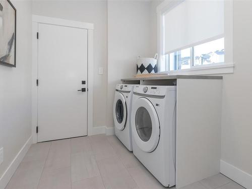 102-2576 Obsidian Pl, Langford, BC - Indoor Photo Showing Laundry Room