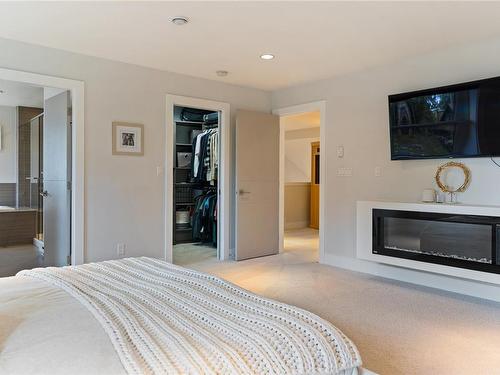 454 Regency Pl, Colwood, BC - Indoor Photo Showing Bedroom With Fireplace