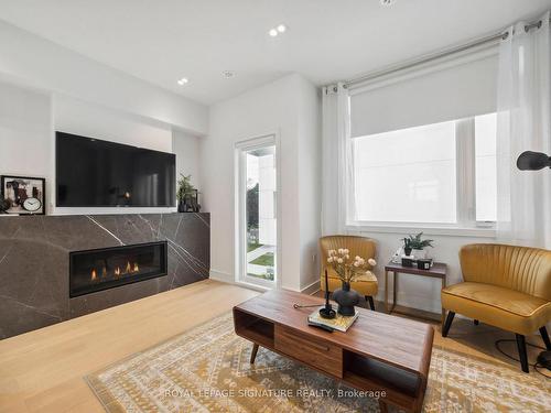 1 Flax Field Lane, Toronto, ON - Indoor Photo Showing Living Room With Fireplace