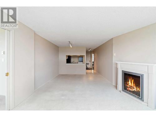 1905 6055 Nelson Avenue, Burnaby, BC - Indoor Photo Showing Living Room With Fireplace