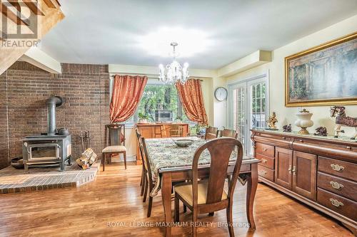 4372 Train Street, New Tecumseth, ON - Indoor Photo Showing Dining Room With Fireplace