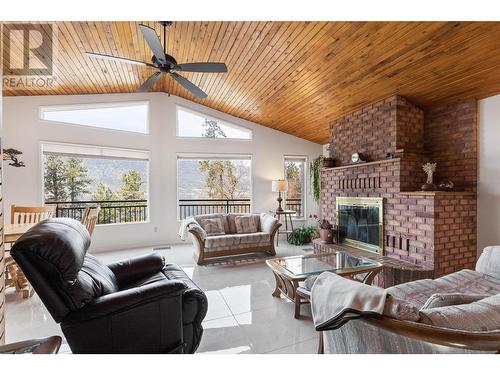9983 Okanagan Centre Road W, Lake Country, BC - Indoor Photo Showing Living Room With Fireplace
