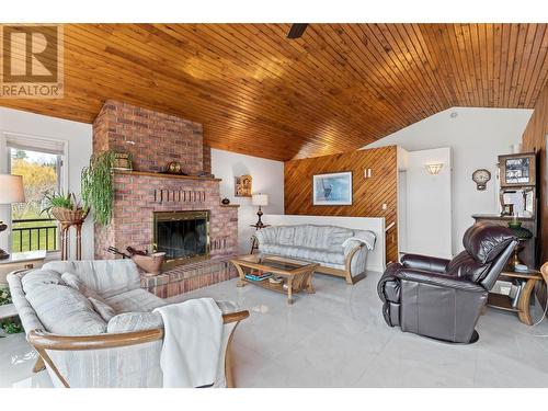 9983 Okanagan Centre Road W, Lake Country, BC - Indoor Photo Showing Living Room With Fireplace