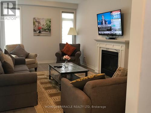 6739 Sam Lorfida Drive, Niagara Falls, ON - Indoor Photo Showing Living Room With Fireplace