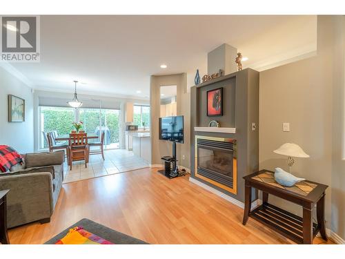 10505 Elliott Street Unit# 2, Summerland, BC - Indoor Photo Showing Living Room With Fireplace