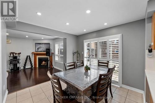 27 Taverner Crescent, Ajax, ON - Indoor Photo Showing Dining Room With Fireplace