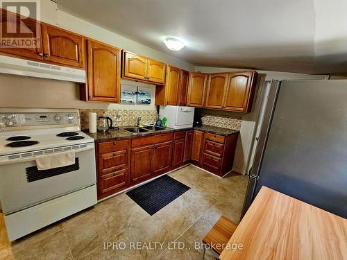 789 Cedar Glen Road, Kawartha Lakes, ON - Indoor Photo Showing Kitchen With Double Sink