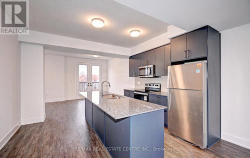 18 - 99 Roger Street, Waterloo, ON - Indoor Photo Showing Kitchen With Stainless Steel Kitchen With Double Sink