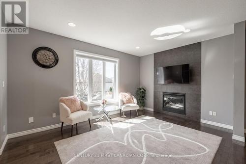 1215 Gough Road, London, ON - Indoor Photo Showing Living Room With Fireplace