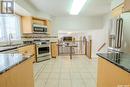10814 Meighen Crescent, North Battleford, SK  - Indoor Photo Showing Kitchen With Stainless Steel Kitchen 