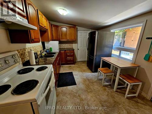 789 Cedar Glen Road, Kawartha Lakes, ON - Indoor Photo Showing Kitchen With Double Sink