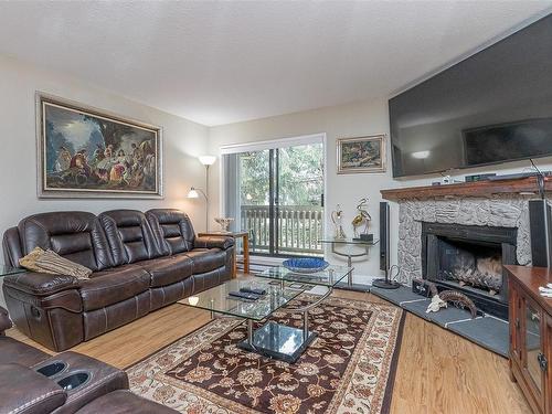 303-363 Morison Ave, Parksville, BC - Indoor Photo Showing Living Room With Fireplace