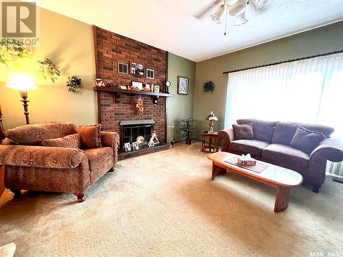 515 Main Street, Turtleford, SK - Indoor Photo Showing Living Room With Fireplace